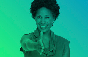 A young woman with short hair extending her hand in greeting